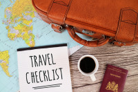 Travel Checklist with Bag Passport Map and Coffee Cup e1551844110398